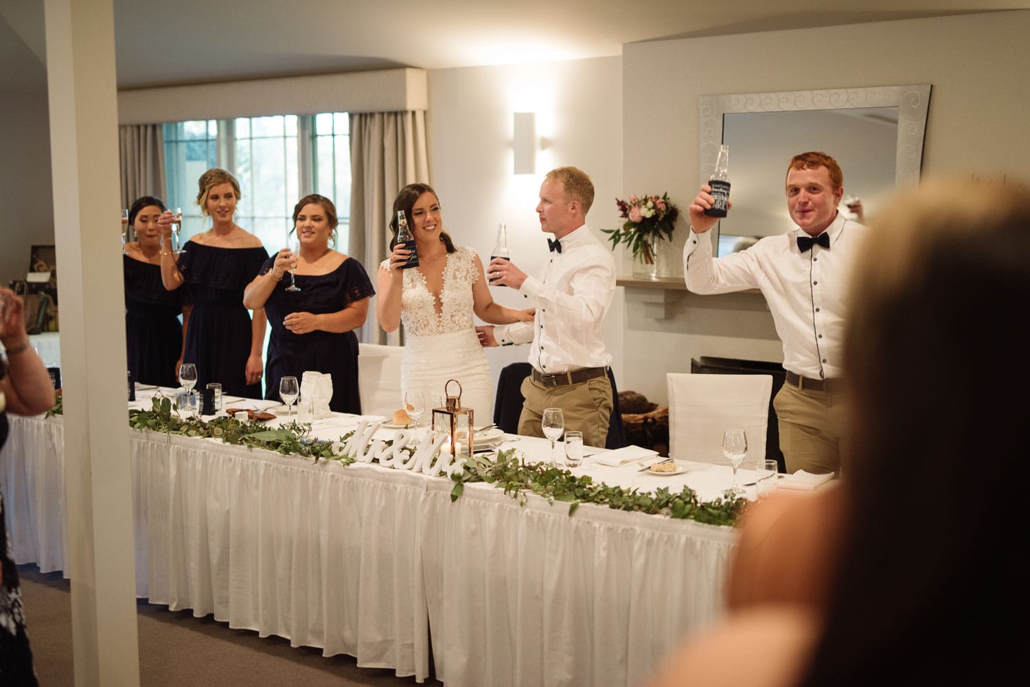 Bride and groom toast their guests