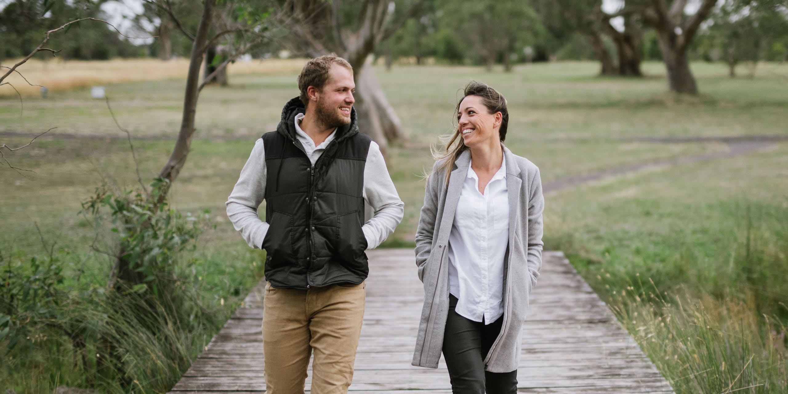 Portrait of couple in love walking towards camera