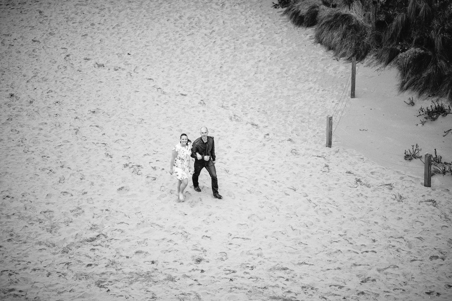 Couple walk on the beach