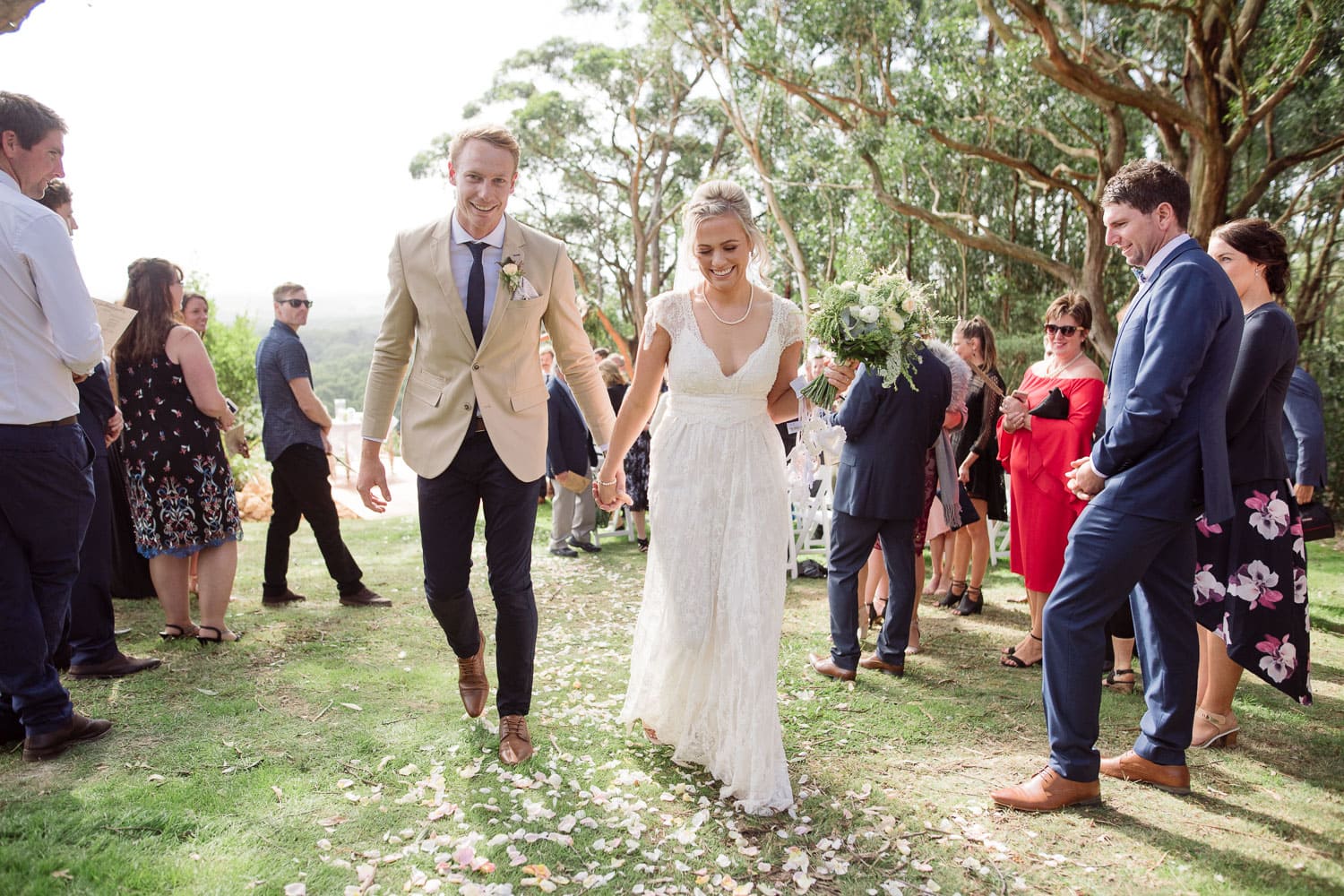 Bride and groom leaving the ceremony