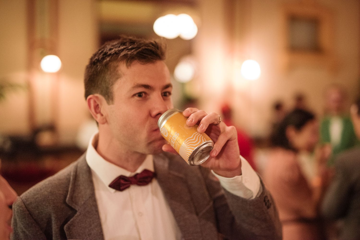 Man drinks quiet deeds beer