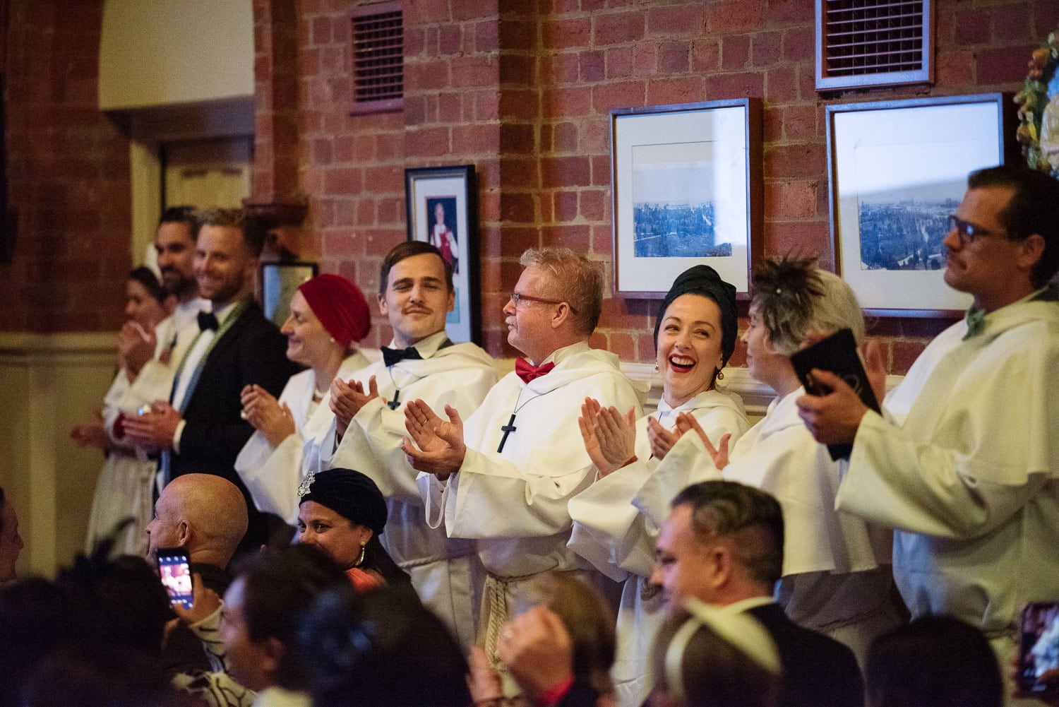 Cast applauding the audience