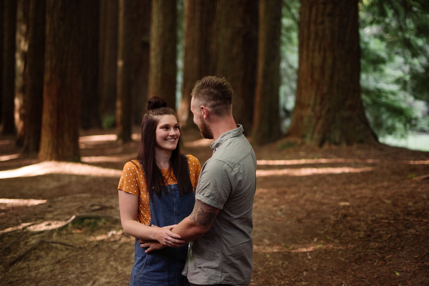 Redwood engagement photograph of Chelsea and Luke amongst Redwood trees