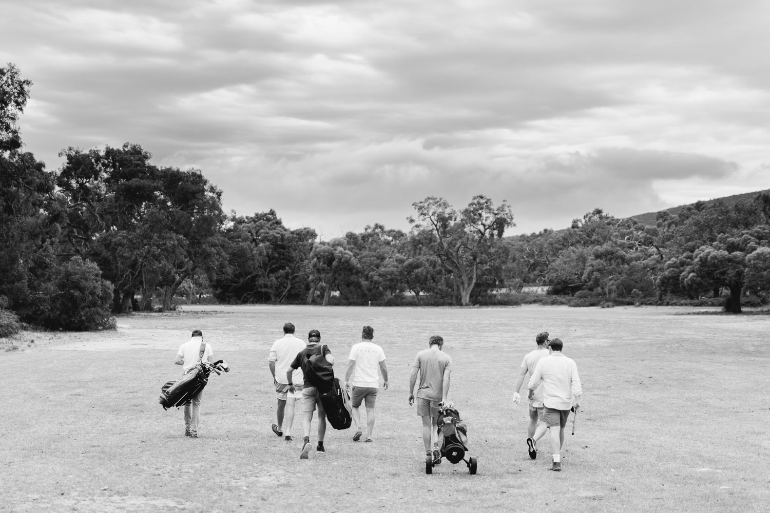 Groomsmen playing golf at Dunkeld golf club