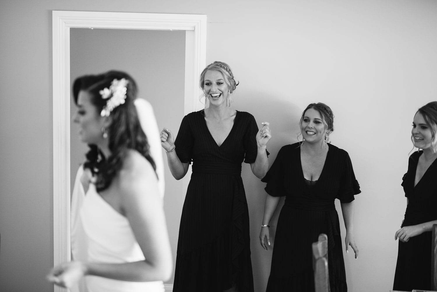 Bridal party excited by dress