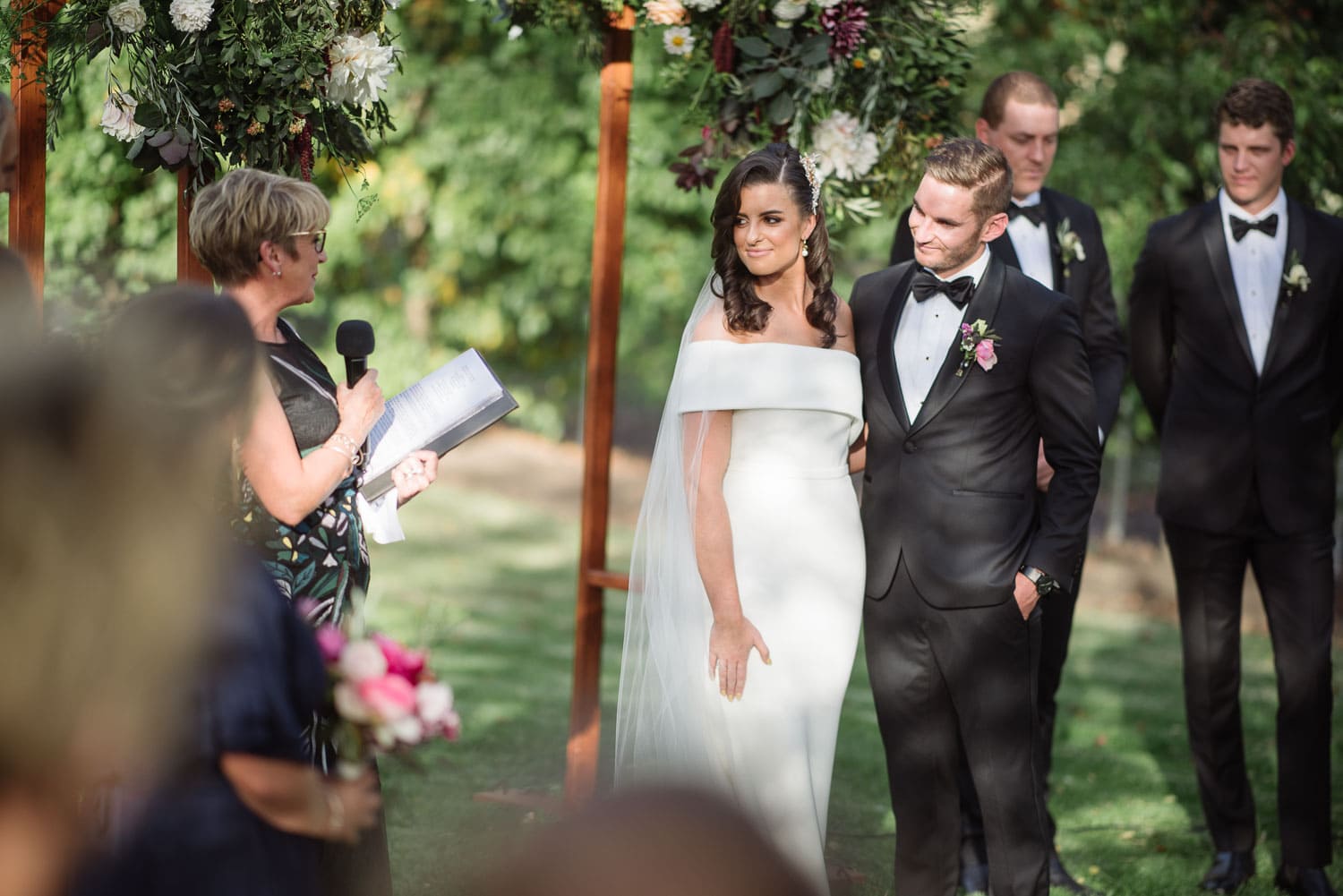 Relaxed speeches at a garden wedding