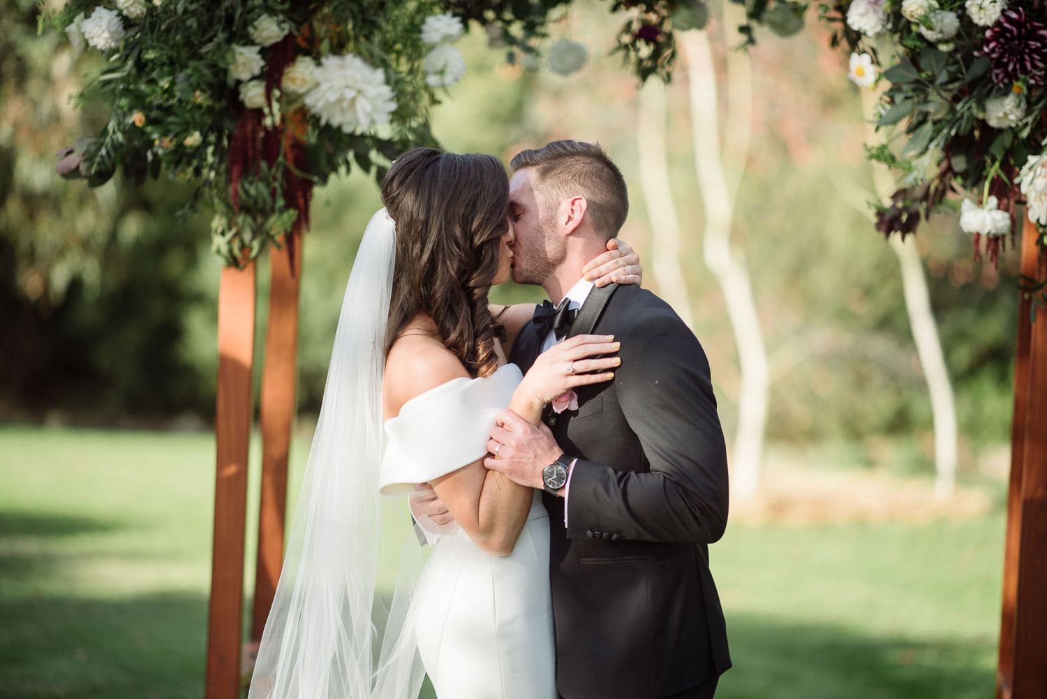 First kiss at a hamilton backyard wedding