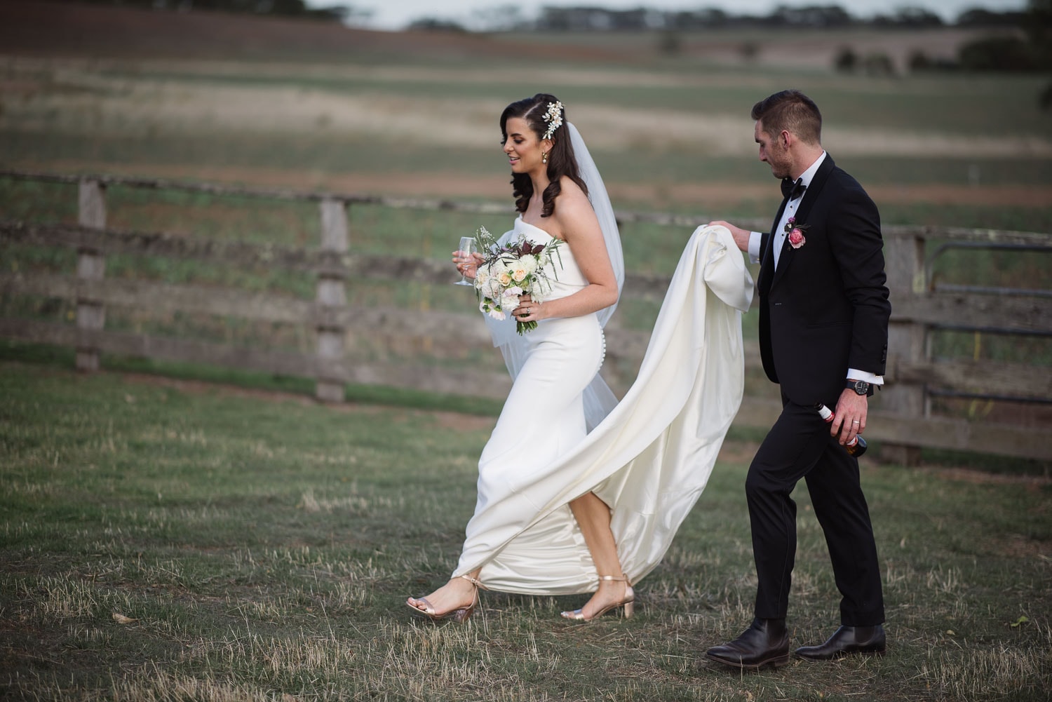 Couple walking after wedding in country victoria