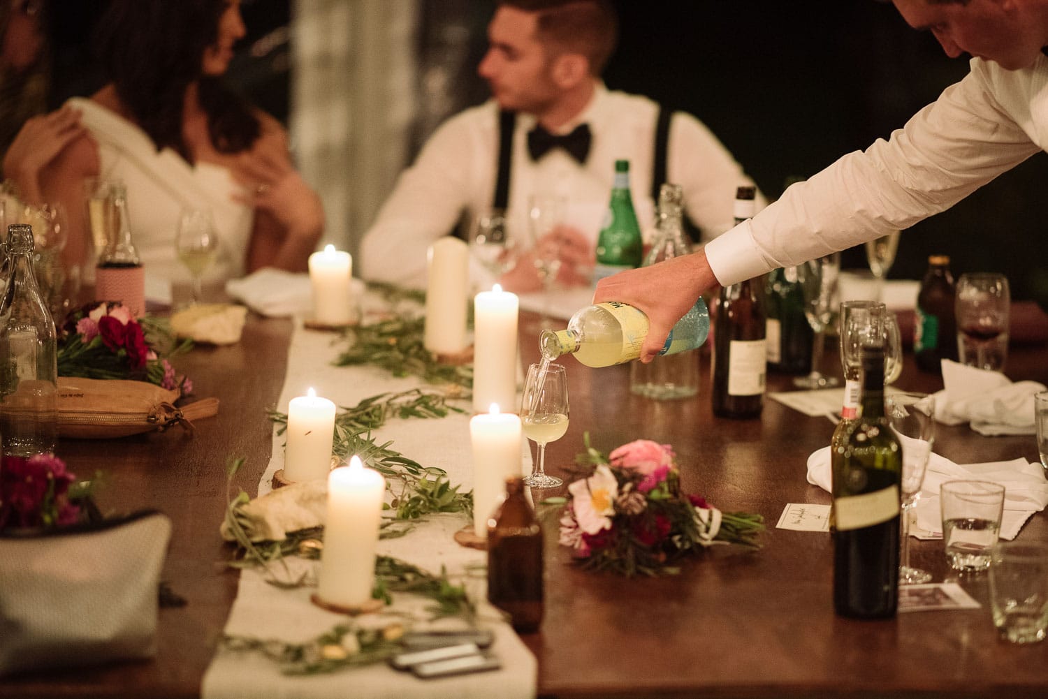 Pouring limoncello at a wedding