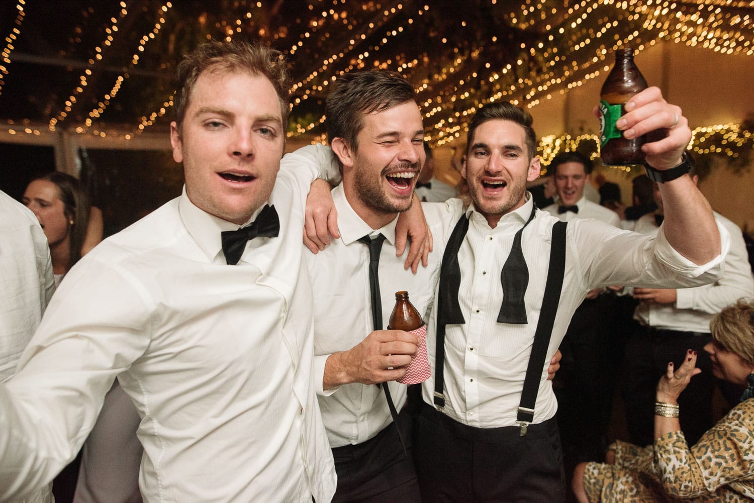 Groom and guests at reception