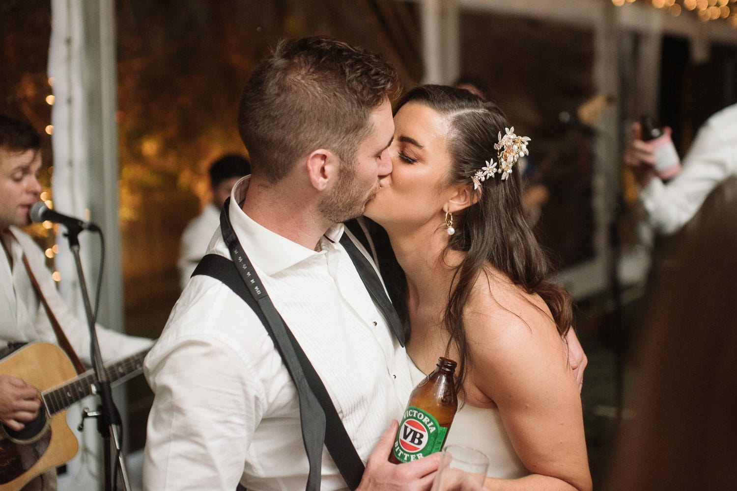 Bride and groom kiss