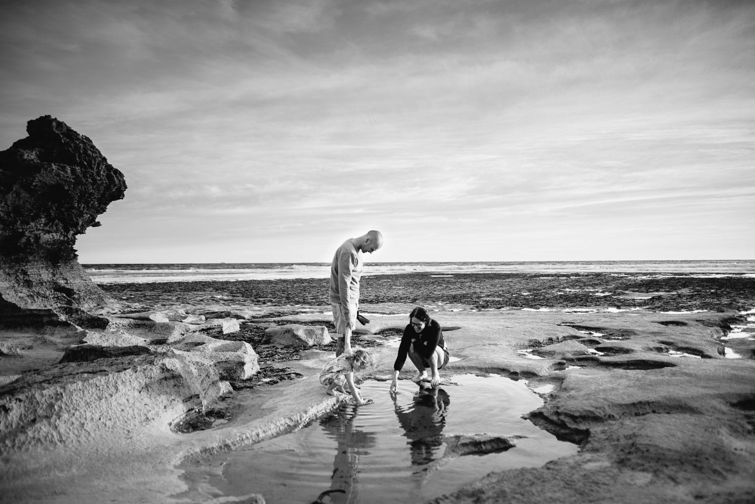 Family play in rockpool near Point Lonsdale