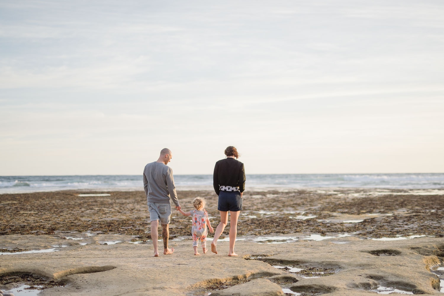 Family walking on Point Lonsdale rocks