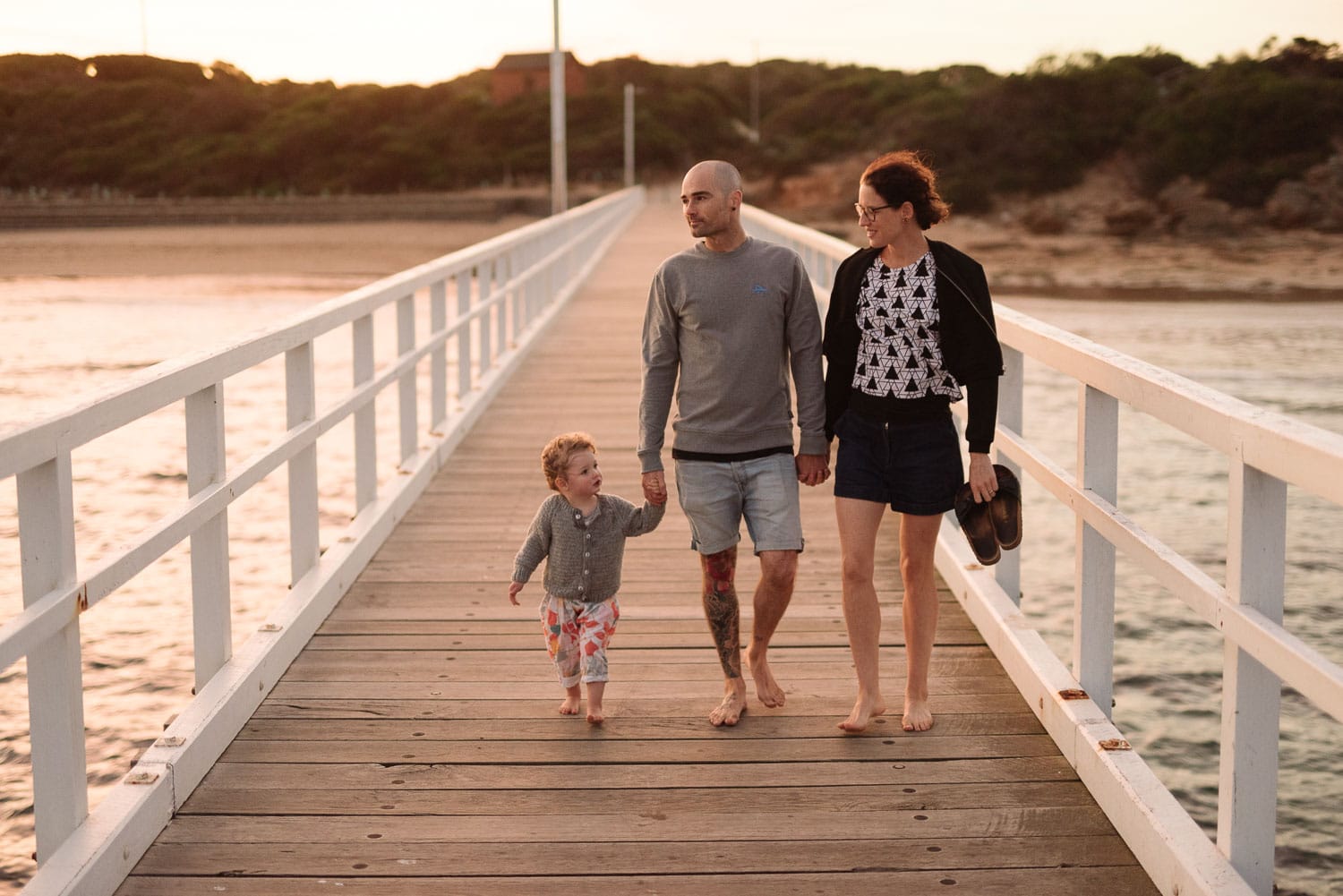 Family walking on geelong pier