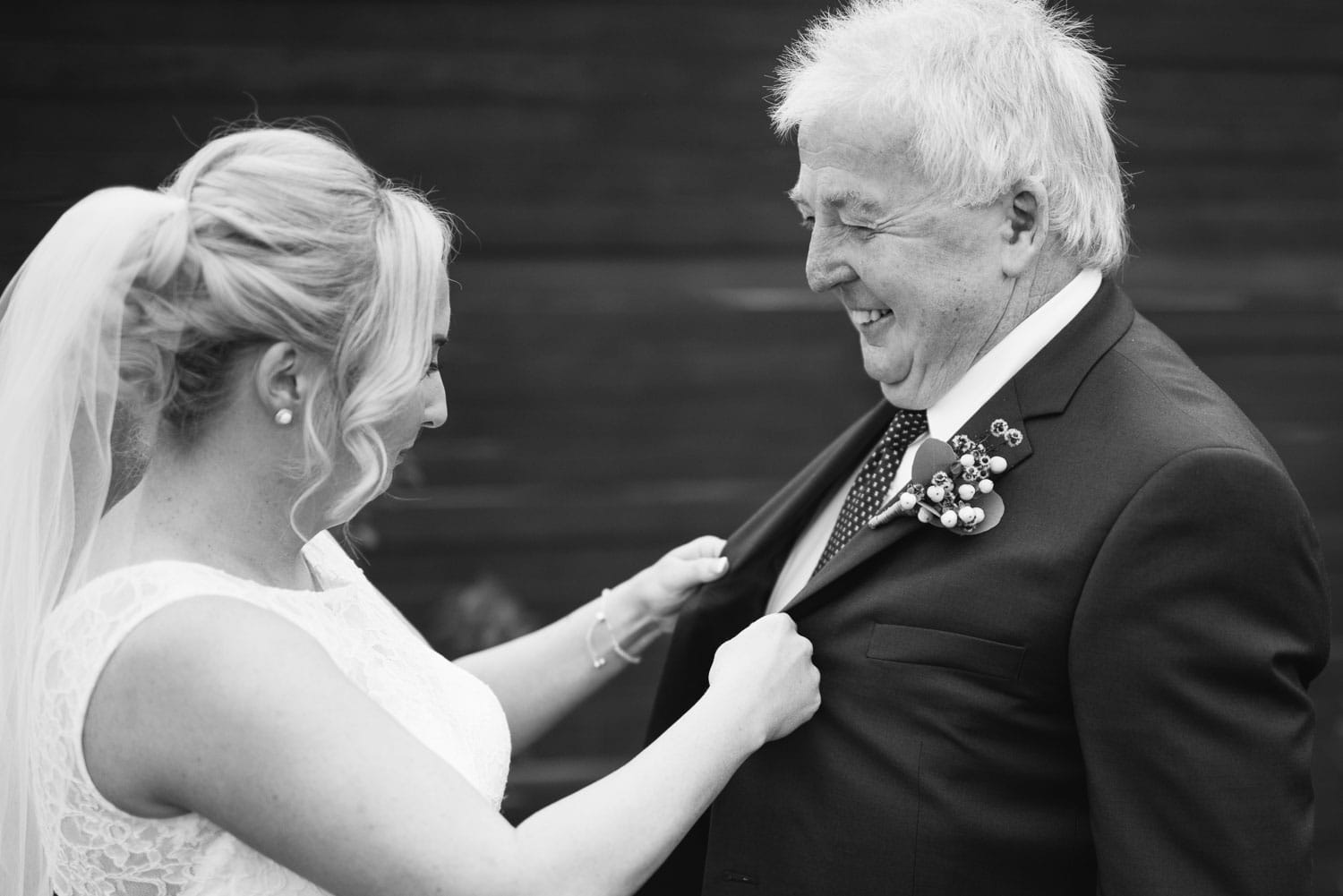 Father of the bride laughing