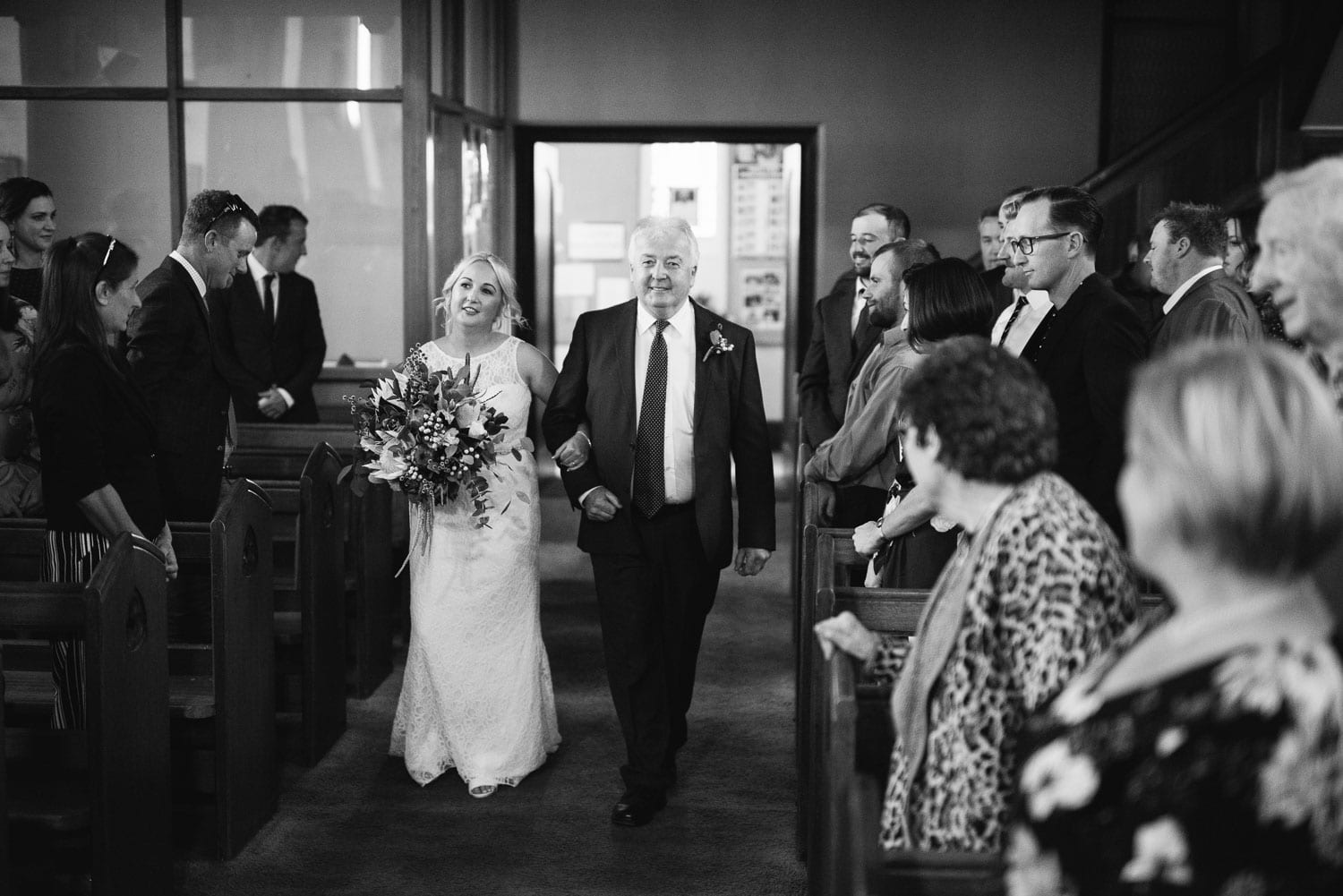 Bride walking down the aisle with her father