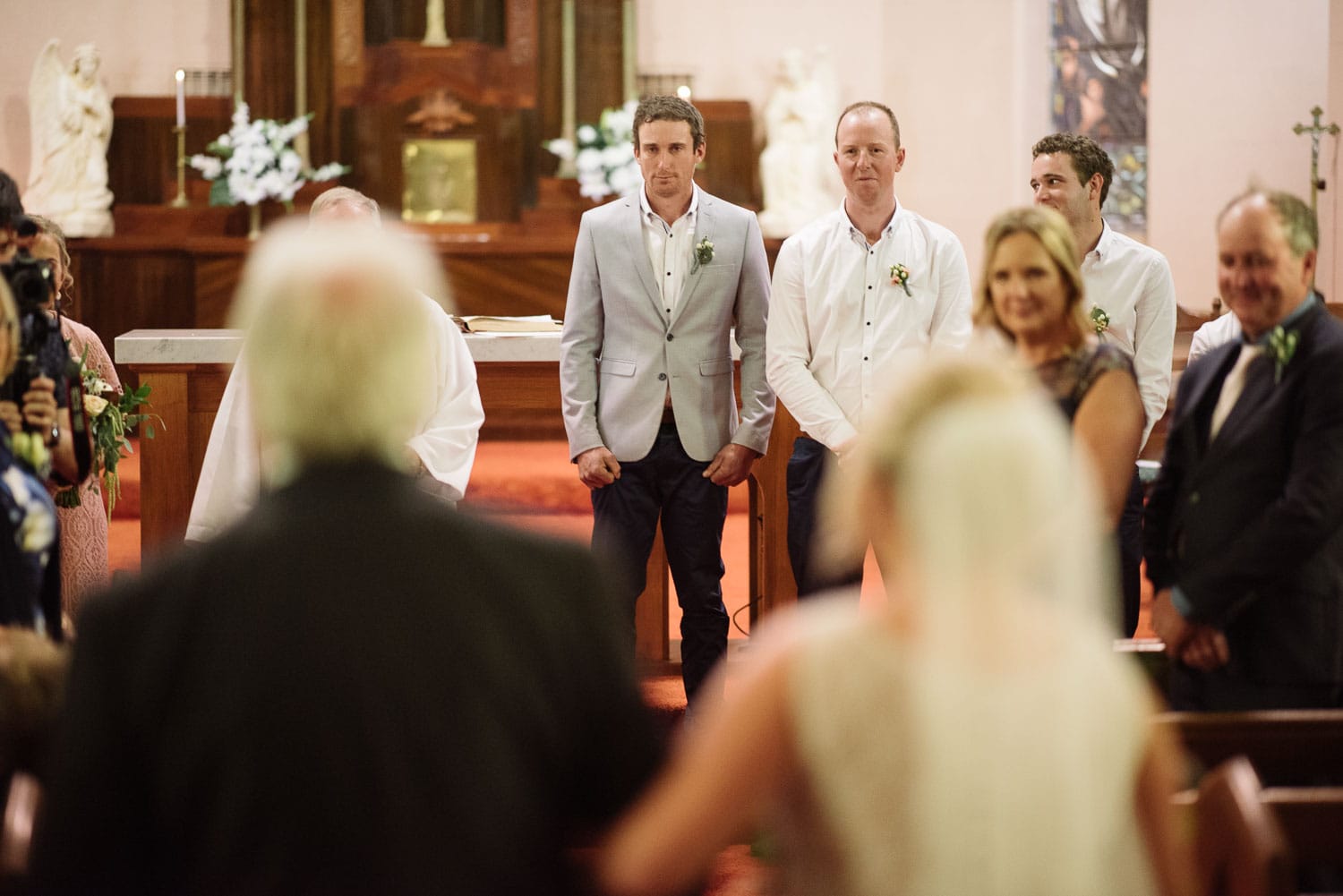 Groom waiting at the altar in St Brendan's Coragulac