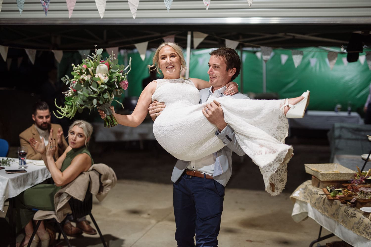 Bride and Groom enter their reception