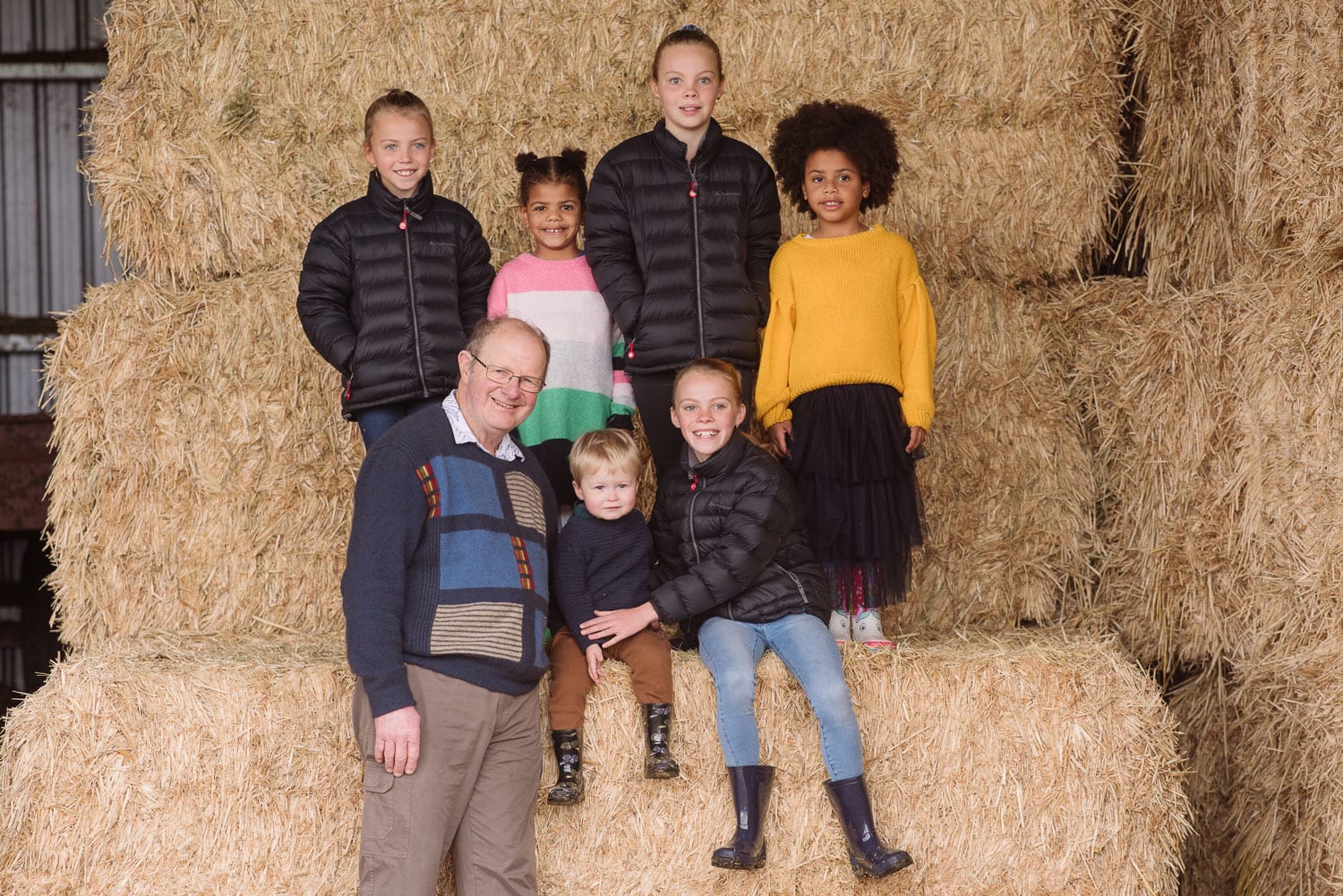 Family portrait in a hayshed