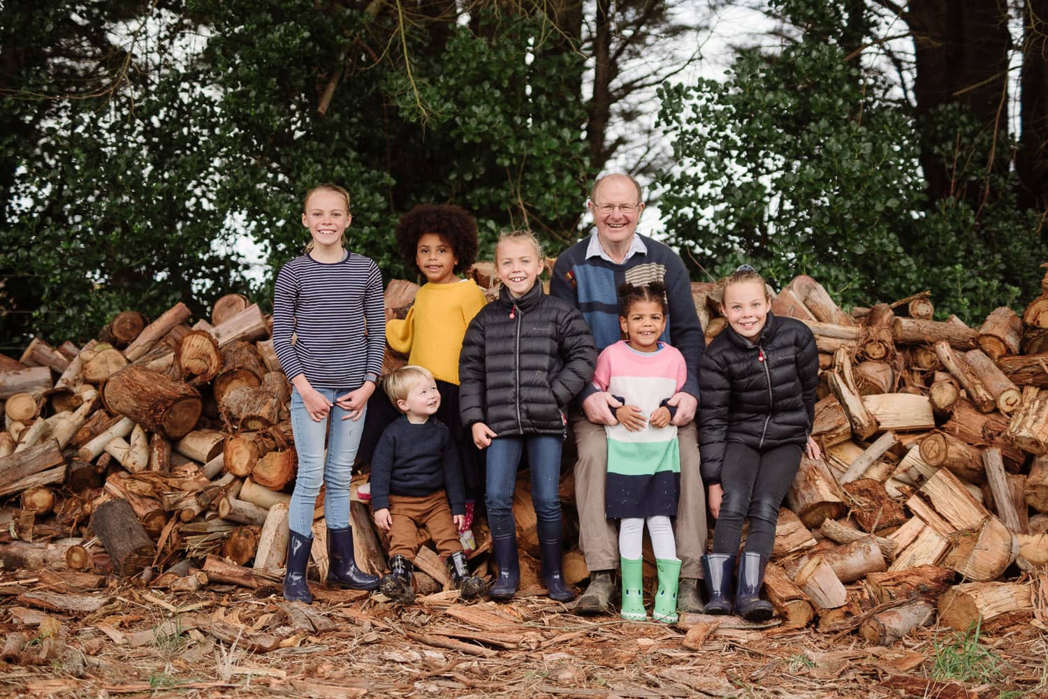 Family portrait on a woodpile
