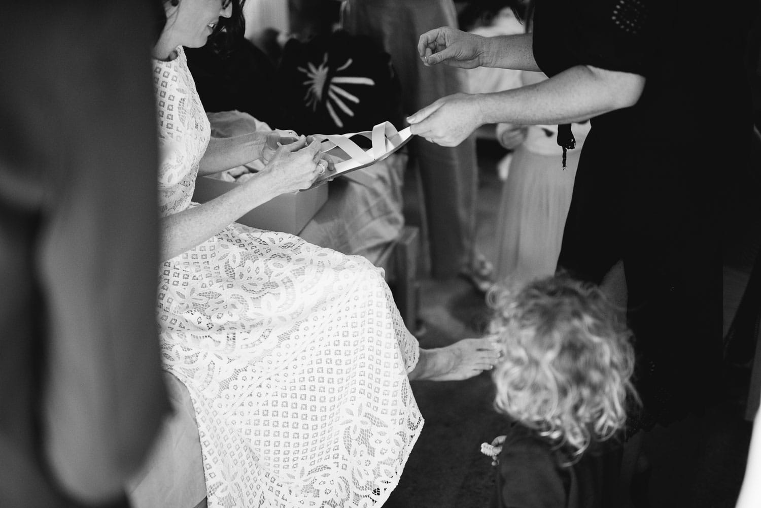 Bride putting on shoes