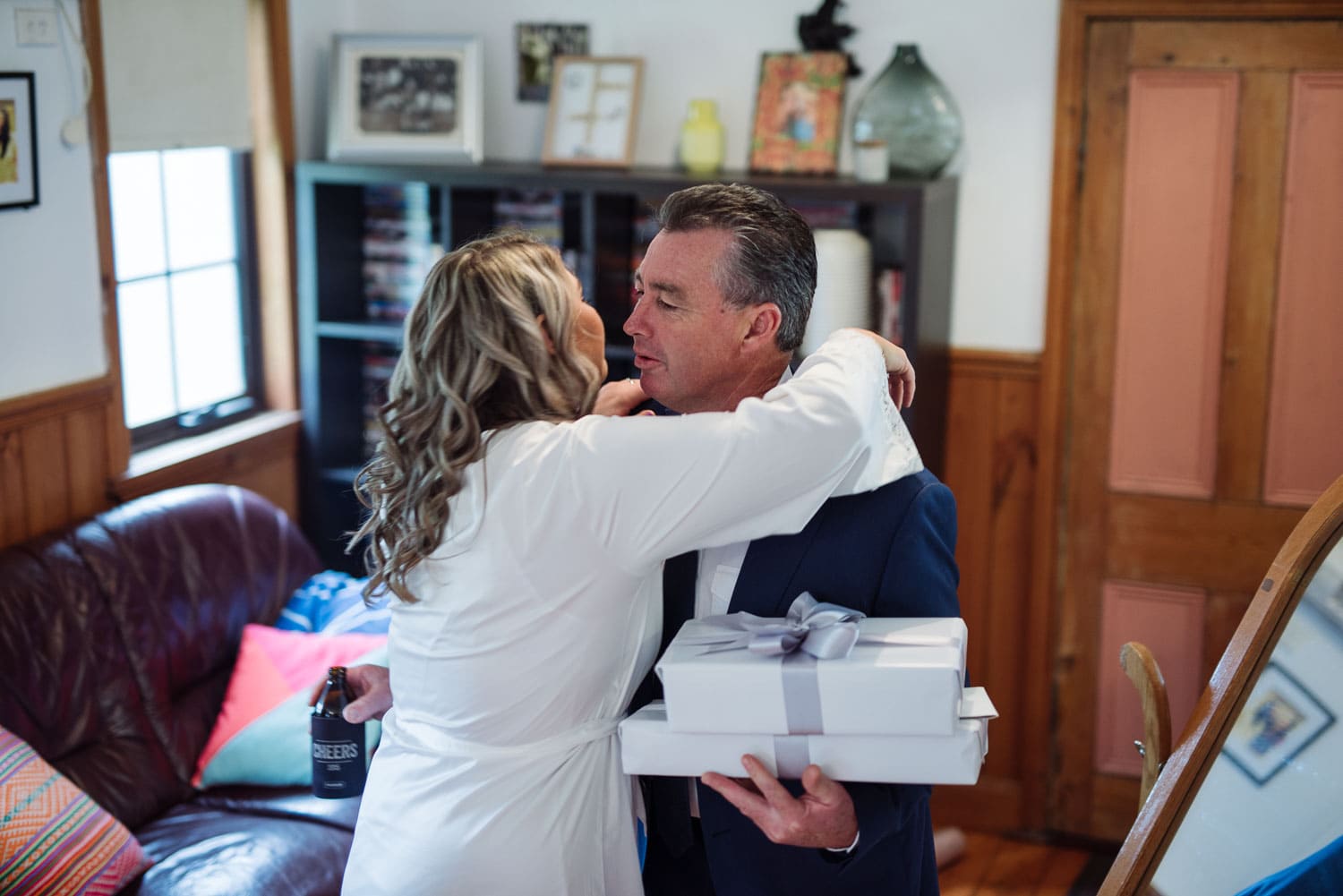 Bride kisses her father before her wedding