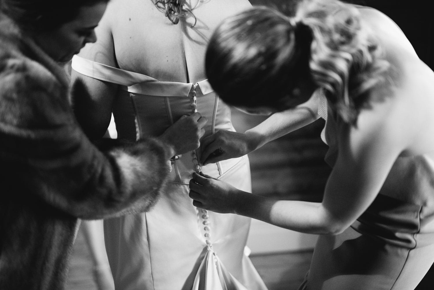 Bride putting on her dress in Koroit