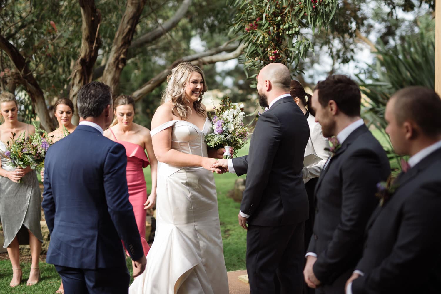 Laughing bride during ceremony