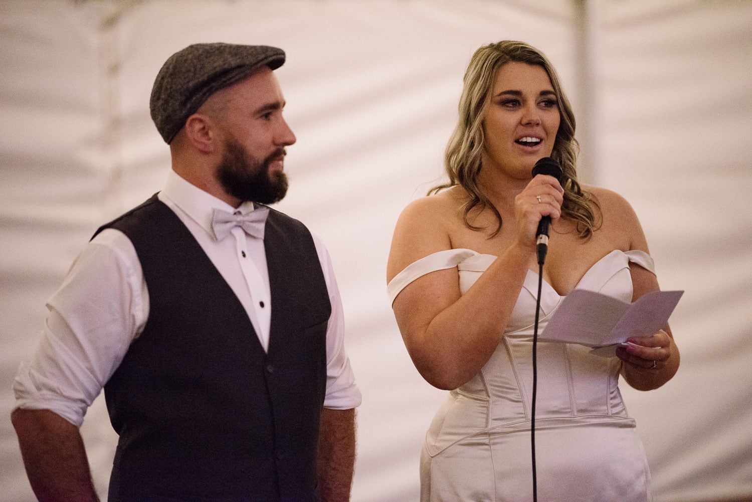 Bride giving a speech post wedding