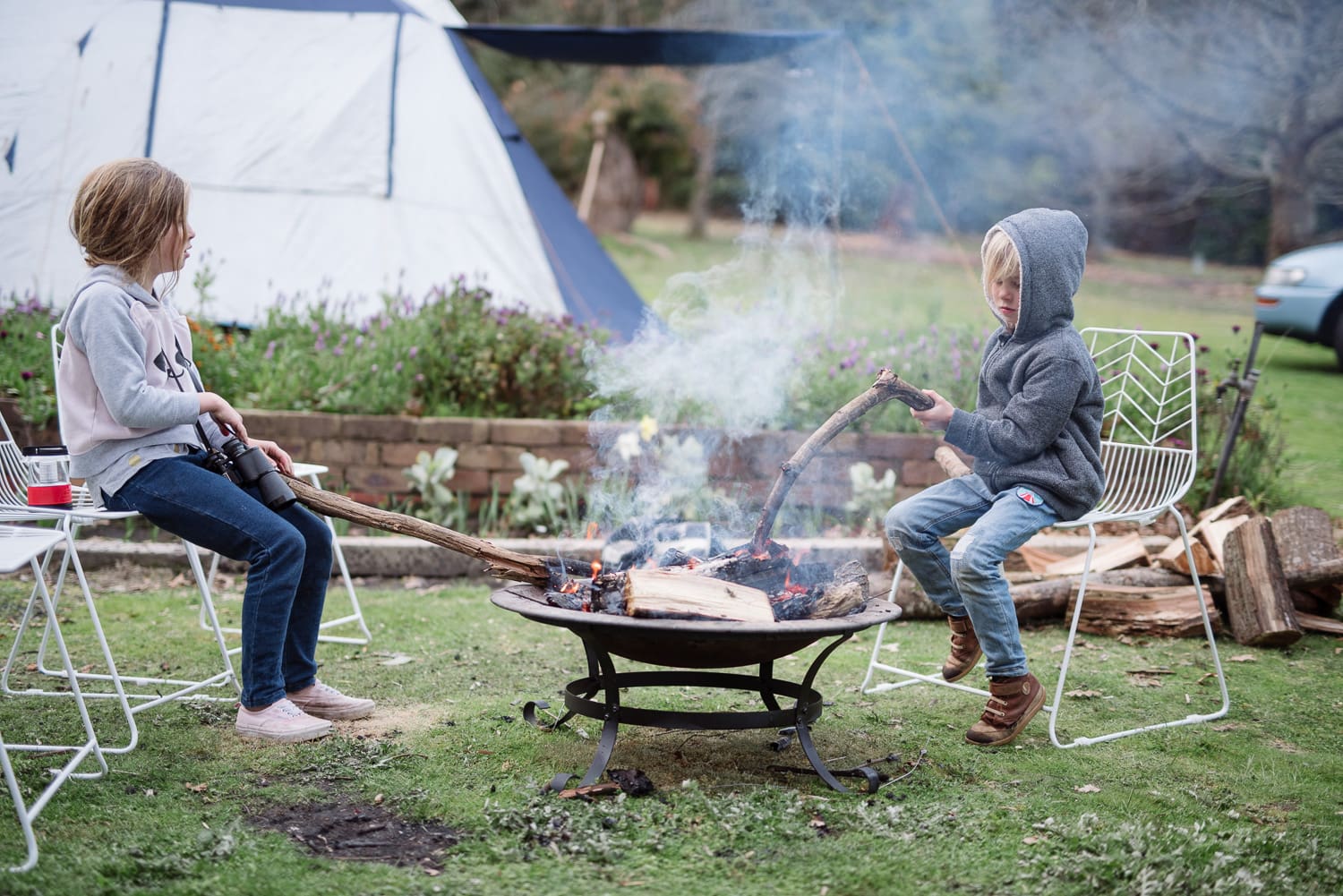 children play with open fire near Colac