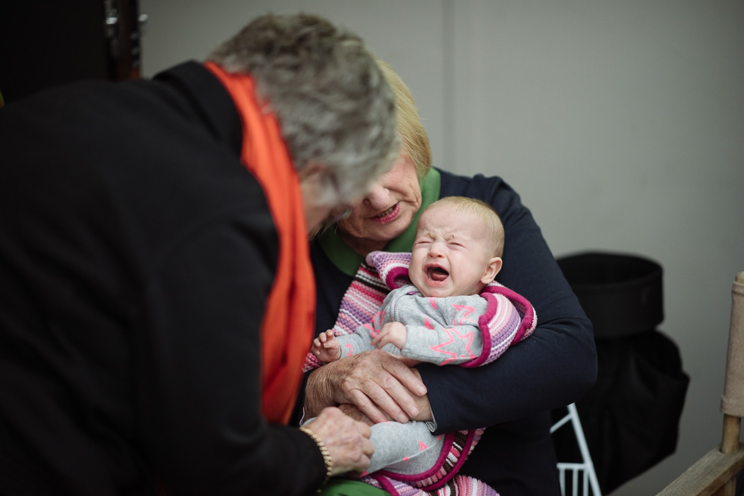 Crying baby at birthday party