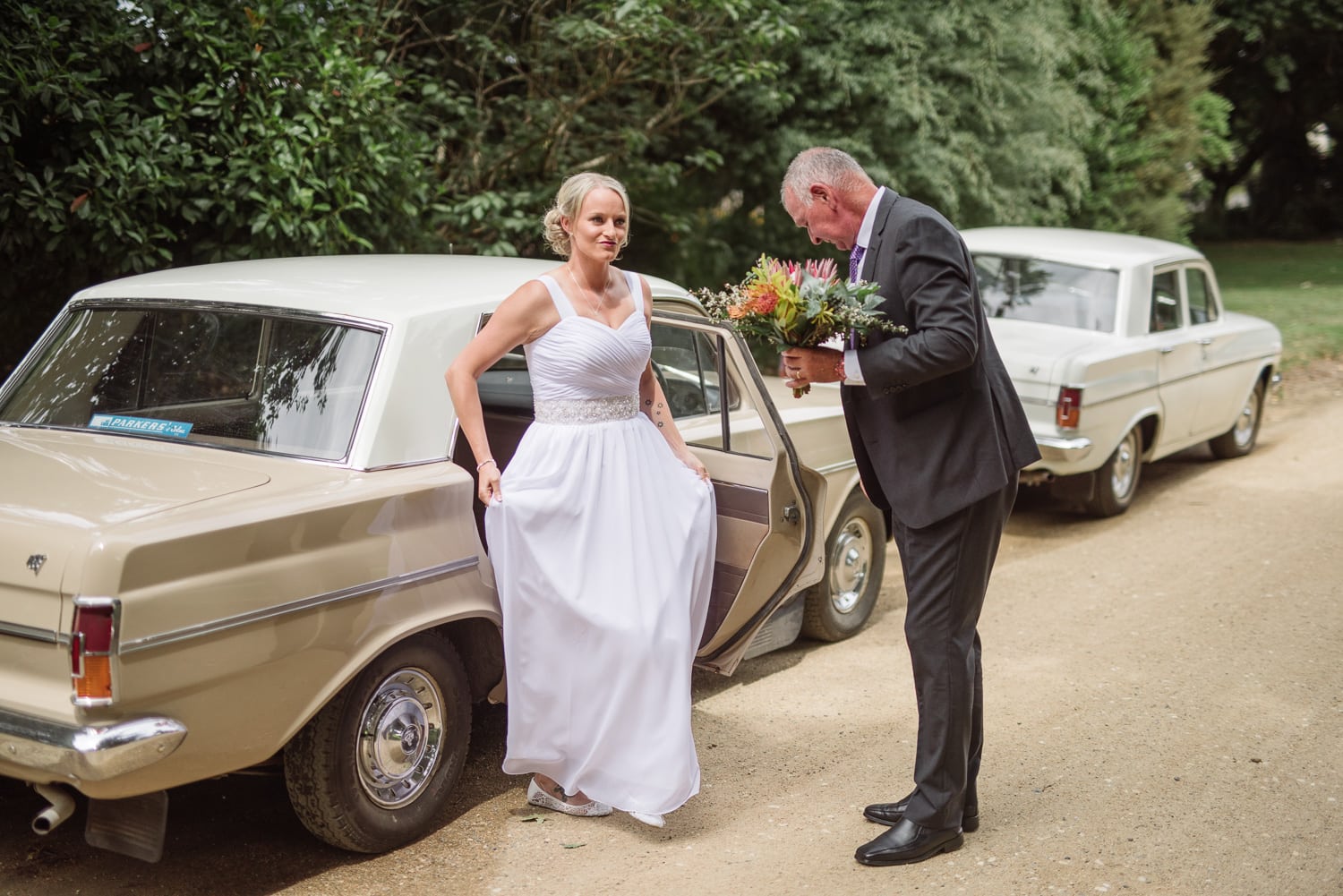 bride getting out of car in colac