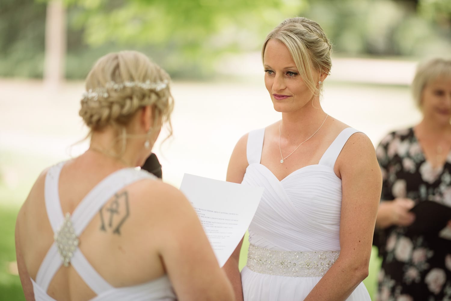 Brides exchange vows at a colac botanic garden wedding