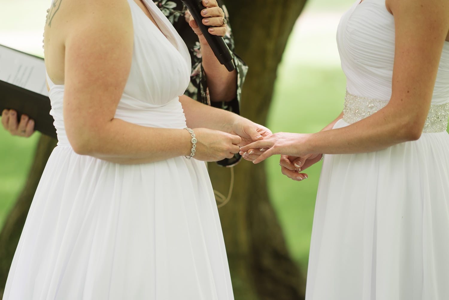 brides exchanging rings