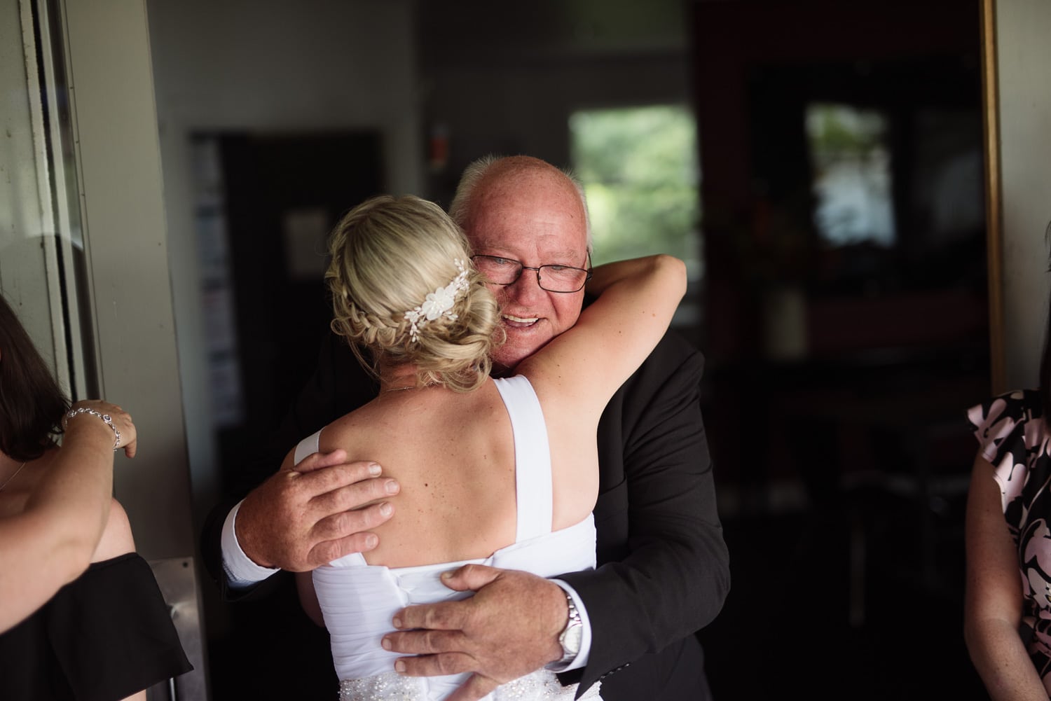 Bride hugging at Colac Cafe on the Lake