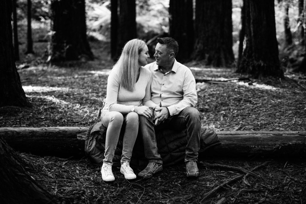 Couple sitting in the Redwoods