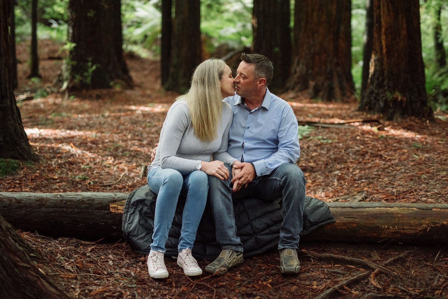 Couple kissing in the Otways Redwoods