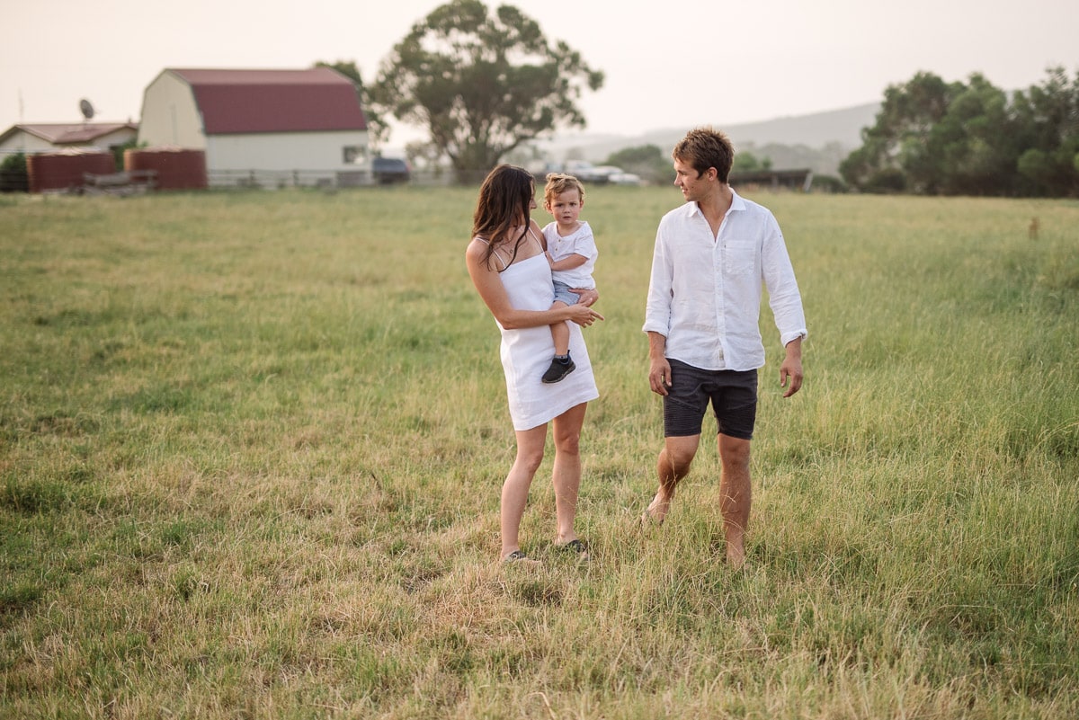 Family in farm paddock near Scotts Creek