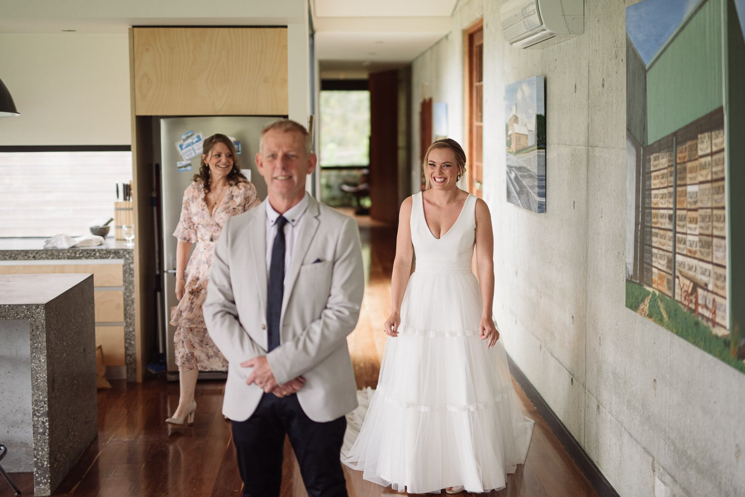 Bride and mother surprise father before her wedding