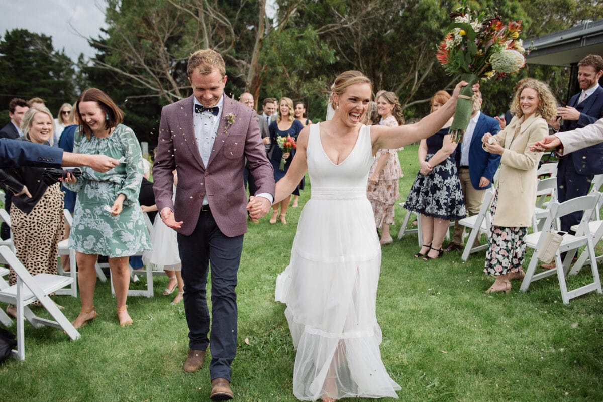 Bride and groom celebrating at their Great Ocean Road wedding