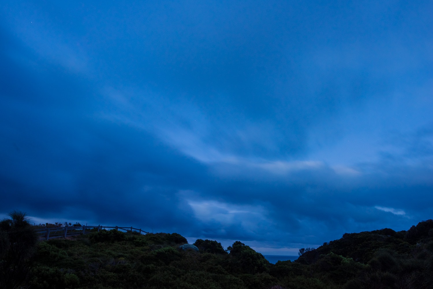 Blue sky at dawn over Castle Cove