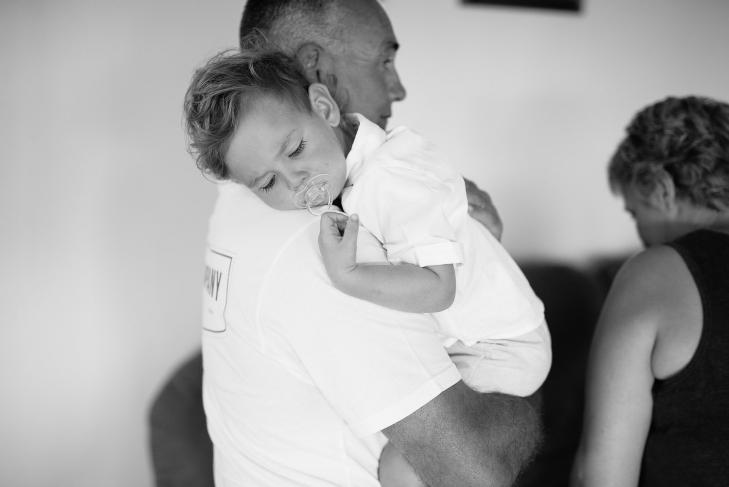 Child sleeping at wedding