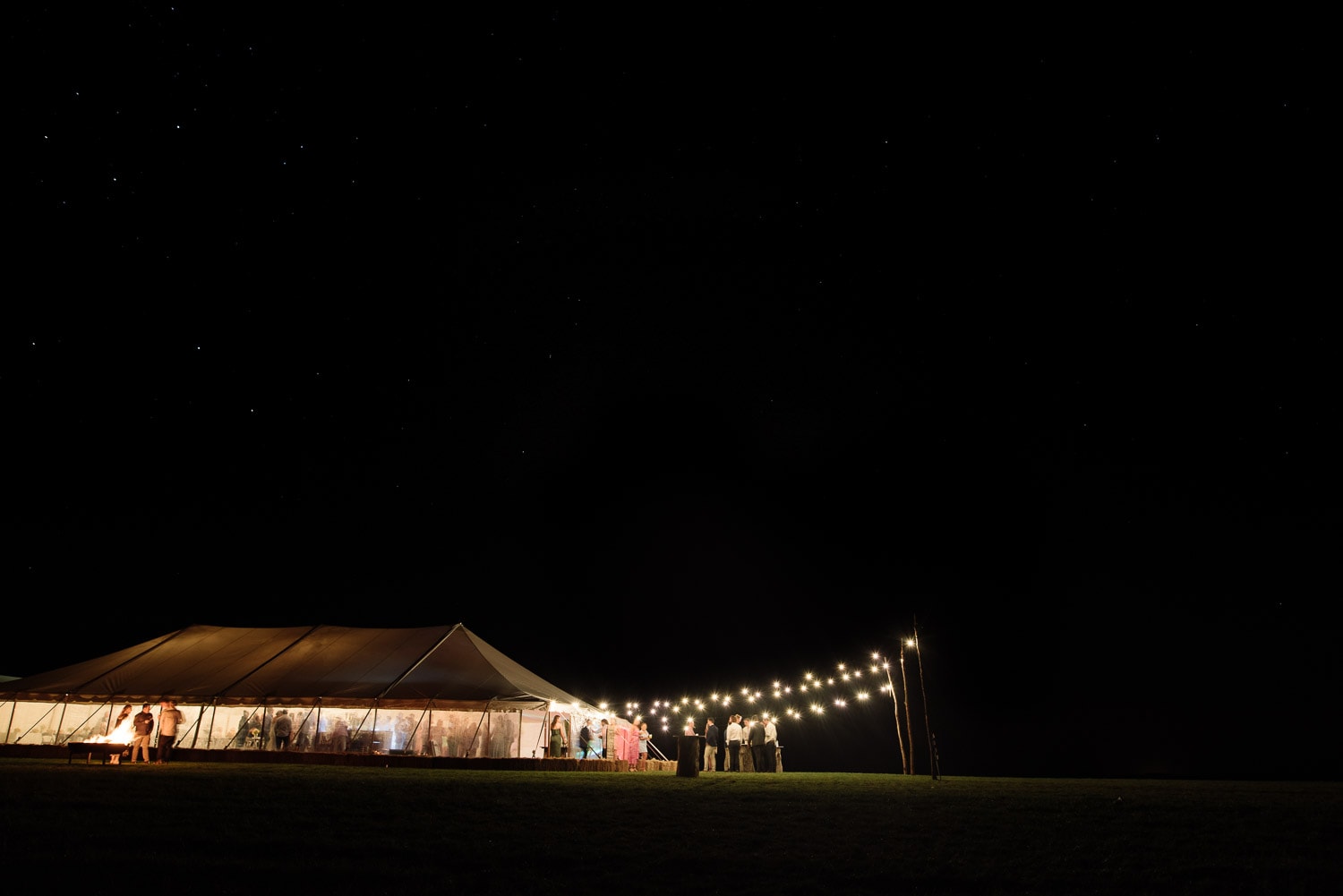 Rural Victorian wedding reception under the stars