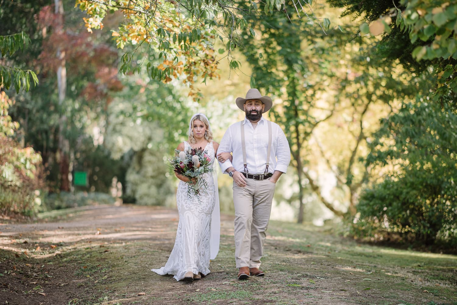 Bride walking down aisle with dad