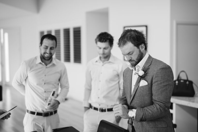 Groom getting dressed in Colac