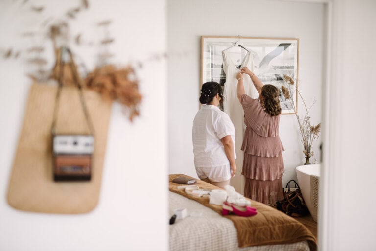 Preparing a wedding dress at Warrnambool Retreat