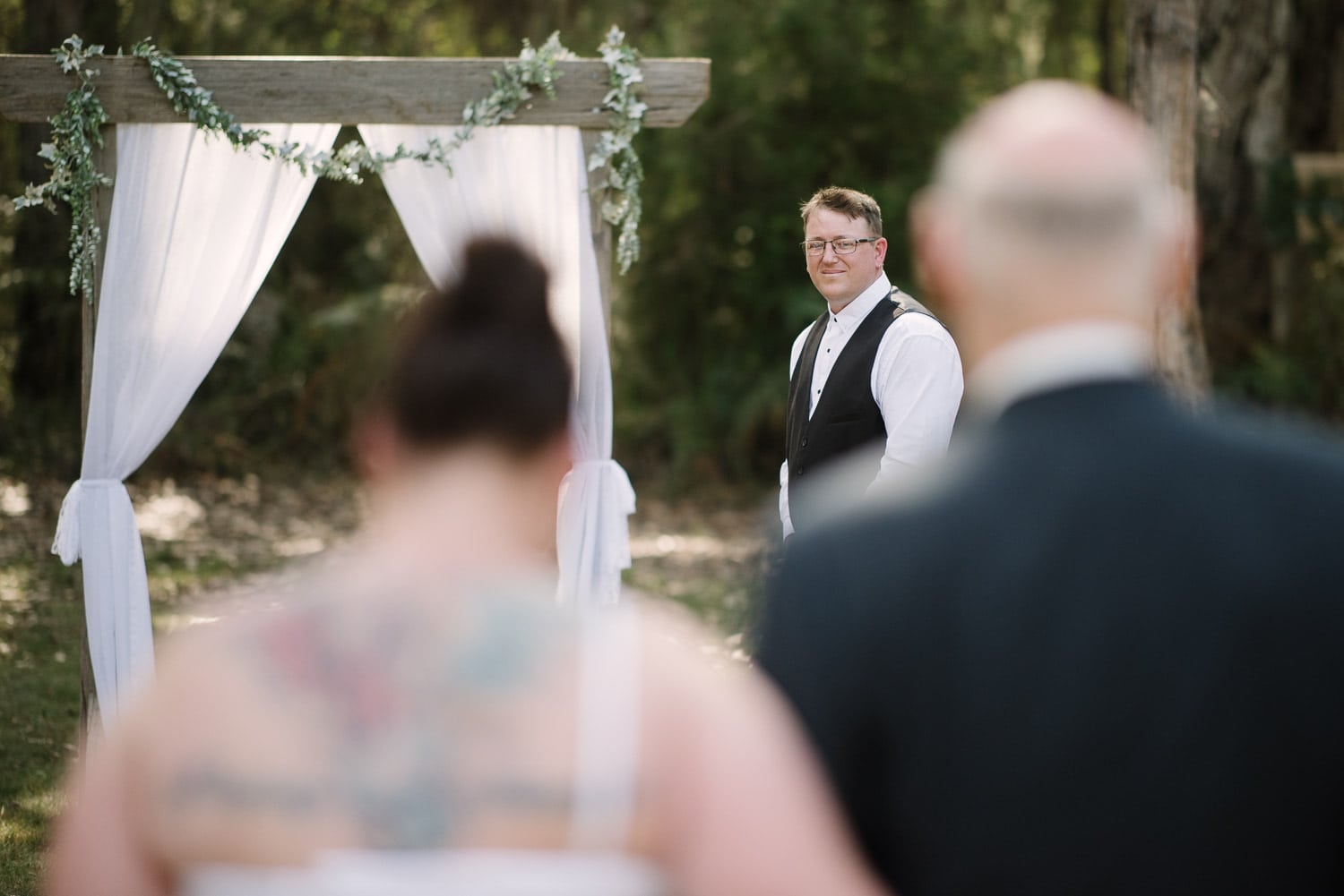 Groom at altar