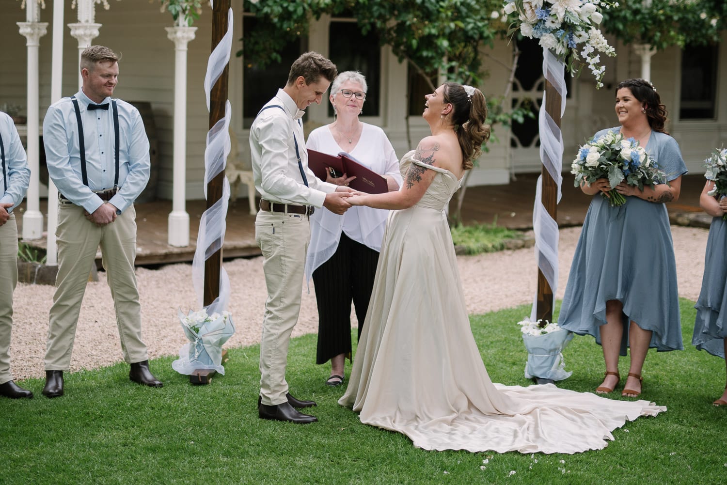 Bride and groom laughing during wedding ceremony