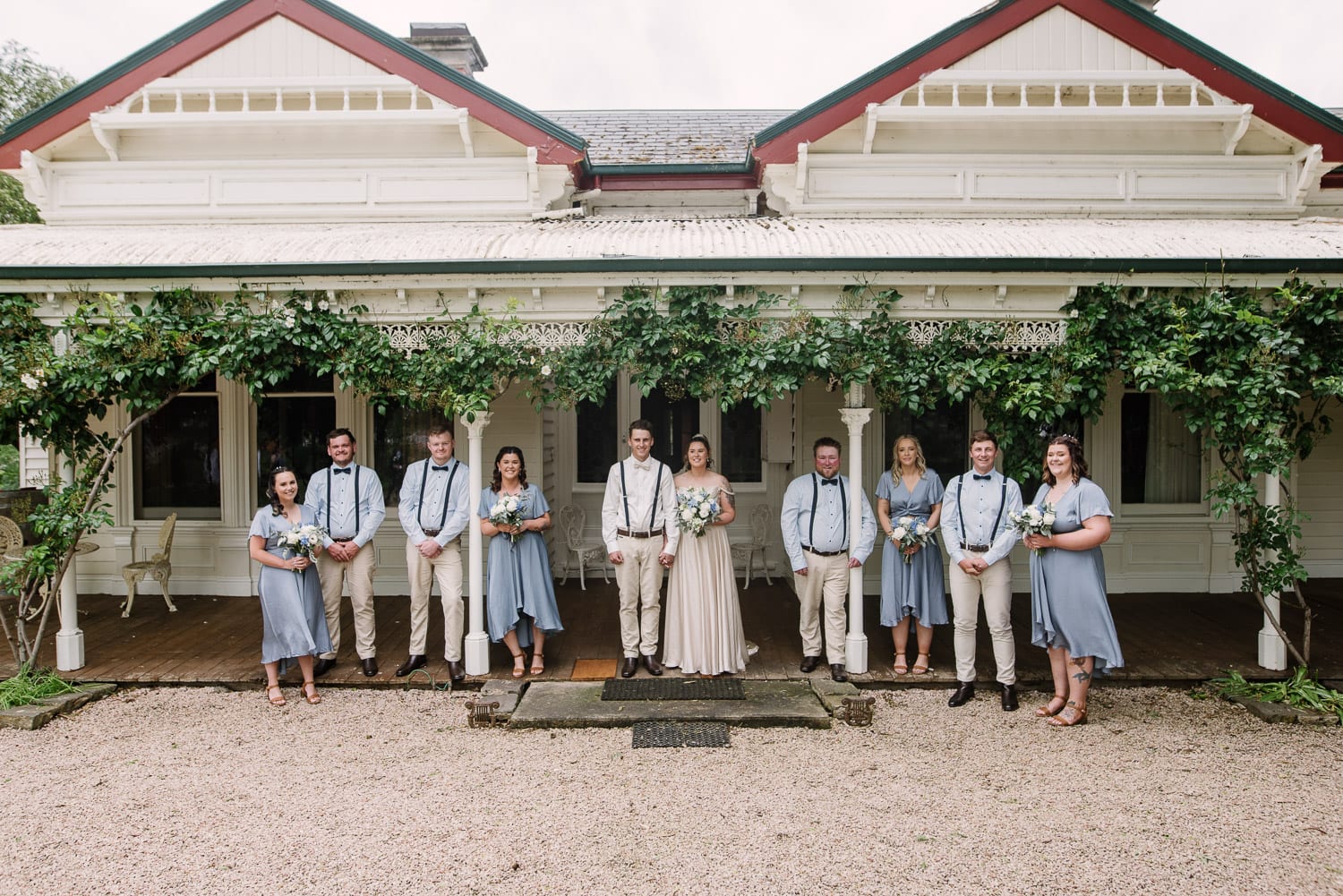 Bridal party on the porch at Quamby Homestead