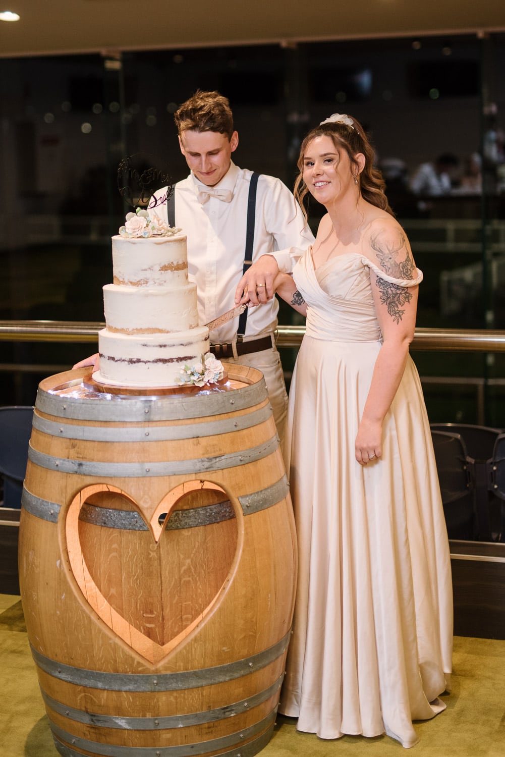 Wedding cake being cut at Warrnambool racecourse